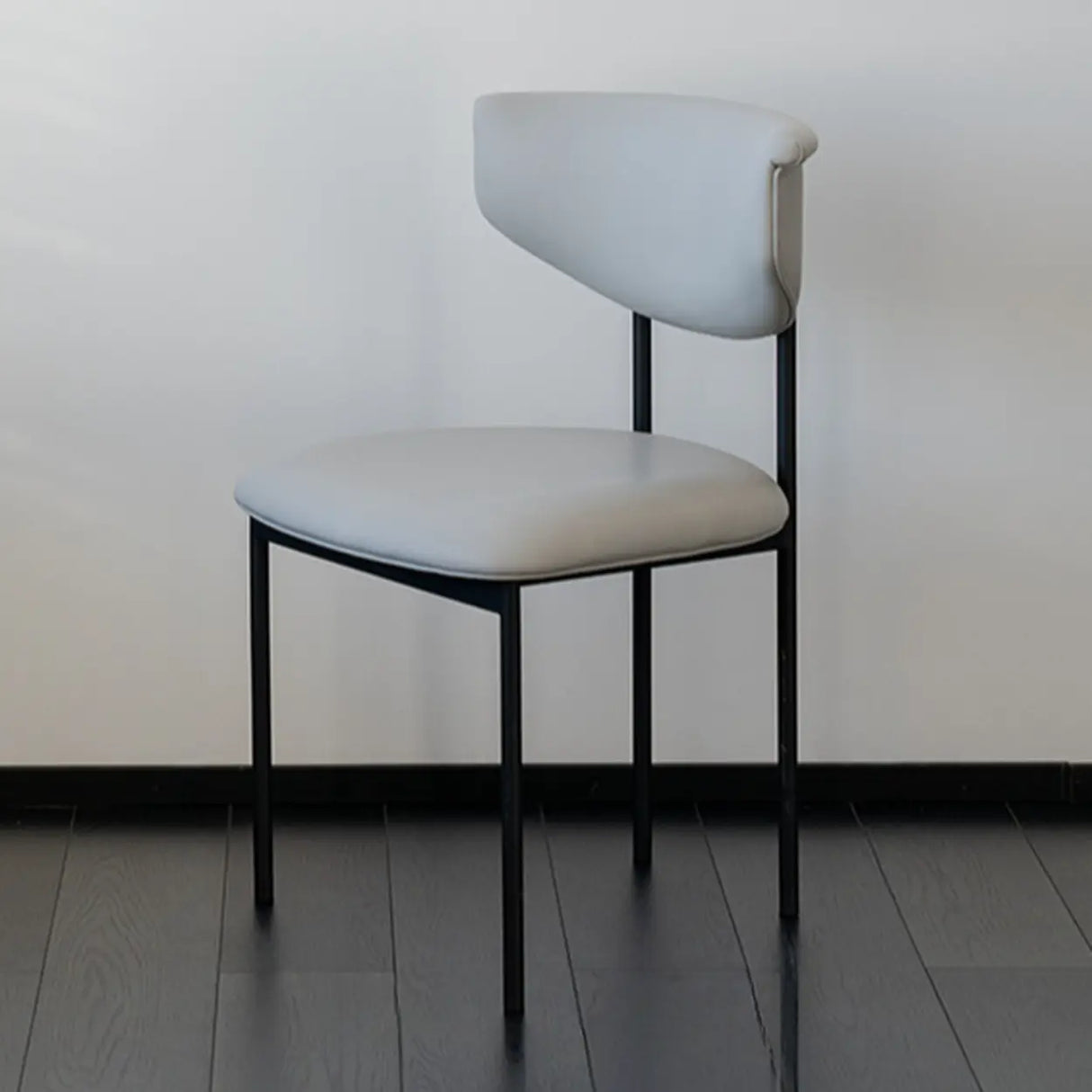 Black Curve Upholstered Low Back Dining Chair Image - 5