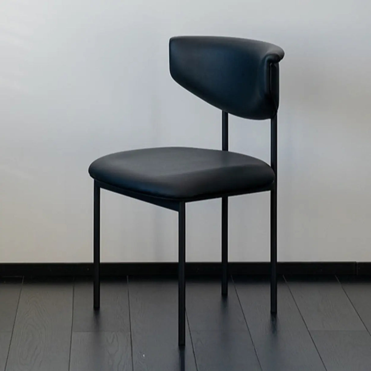 Black Curve Upholstered Low Back Dining Chair Image - 9