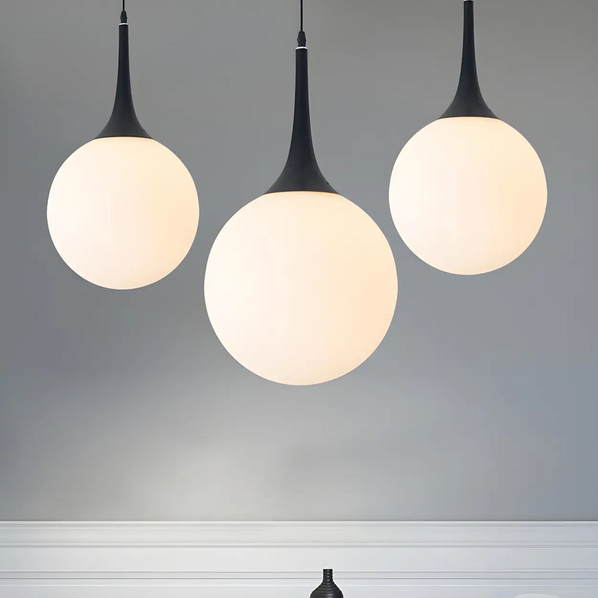 Minimalist White Globe-Shaped Glass Pendant Light Image - 2