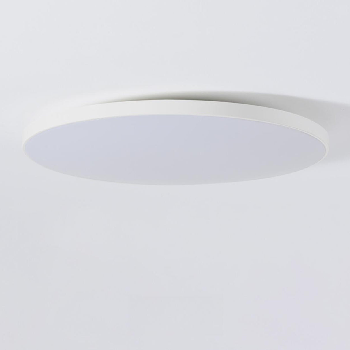 Minimalist White Round LED Flush Mount Ceiling Light Image - 10