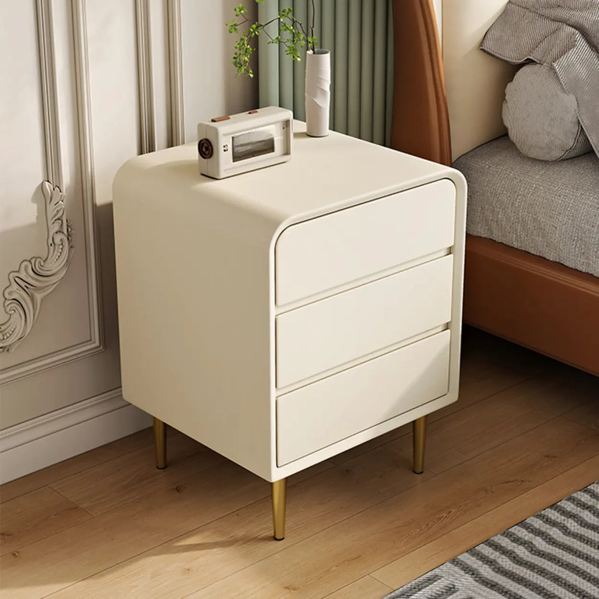 Modern Cream Leather Nightstand with Drawers and Gold Legs Image - 1