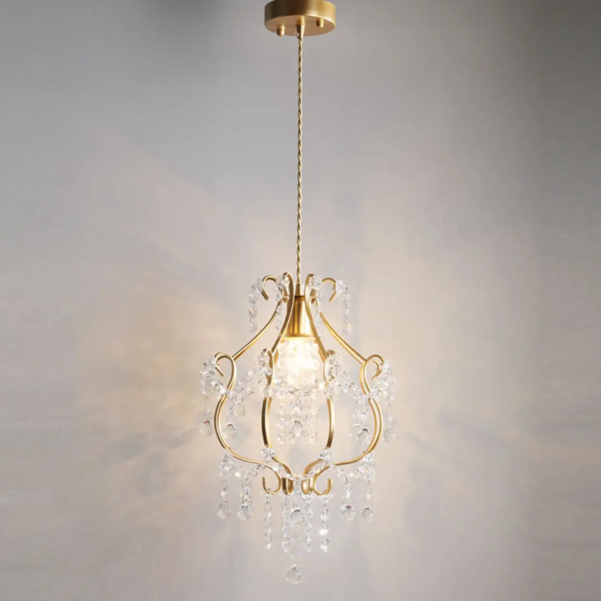 Modern Golden Elegance Crystal Geometric Pendant Light Image - 2