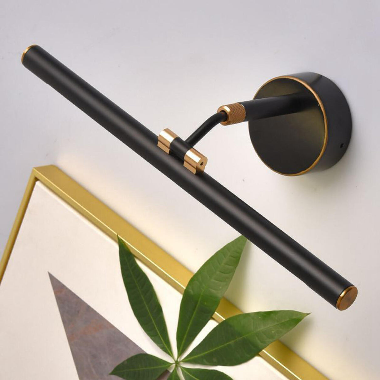 Modern Sleek Black and Gold Cylinder Vanity Light Image - 4