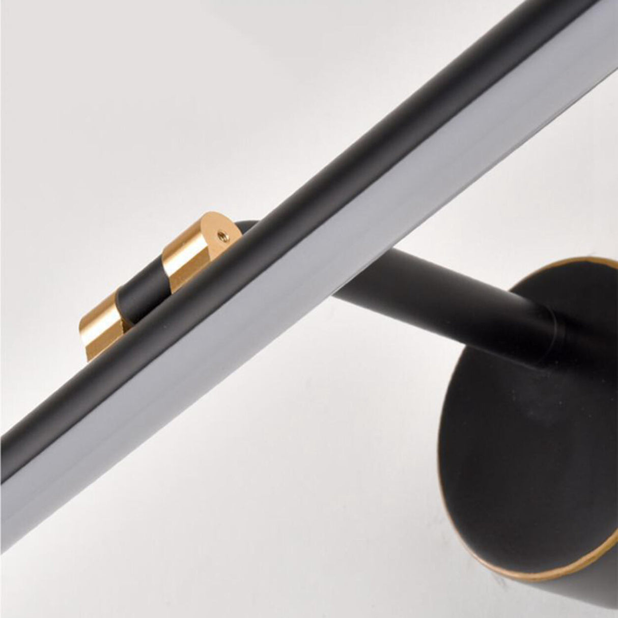 Modern Sleek Black and Gold Cylinder Vanity Light Image - 9
