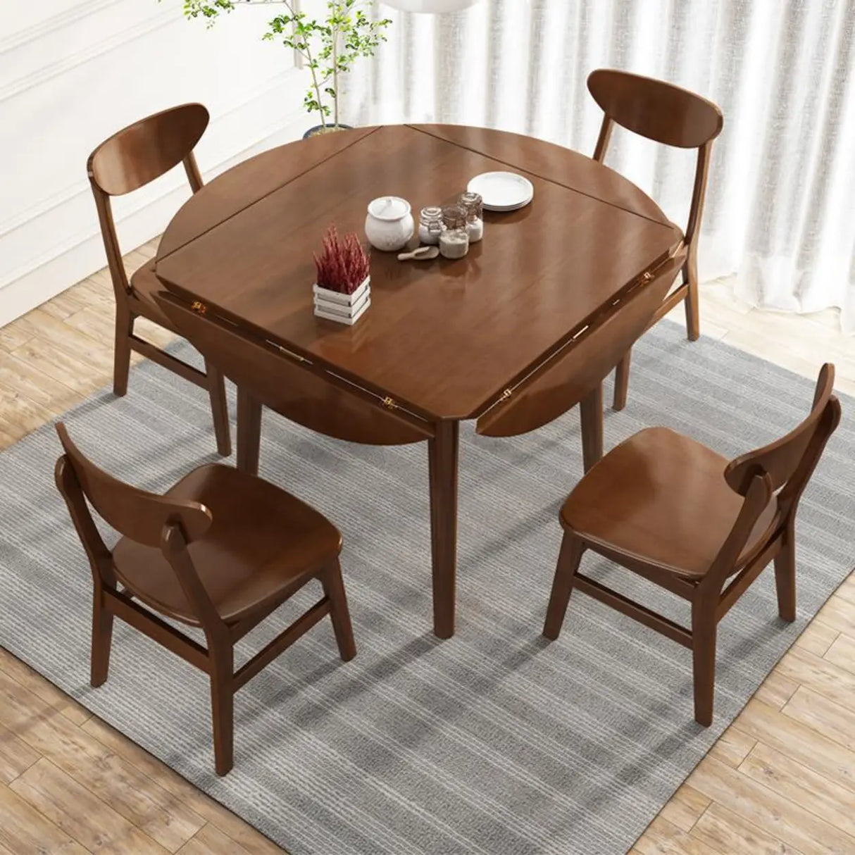 Modish Natural Round Rubberwood Extendable Dining Table Image - 2