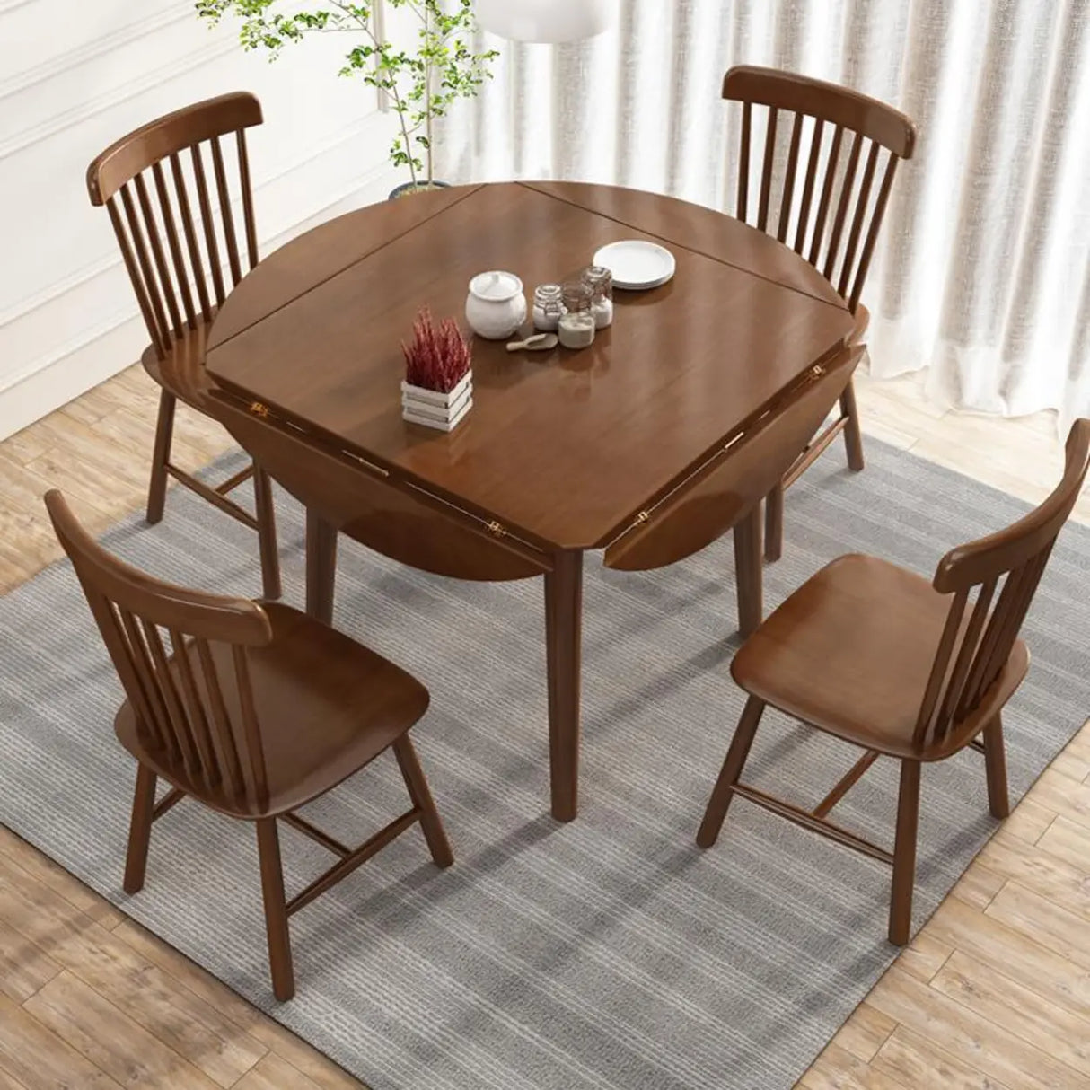 Modish Natural Round Rubberwood Extendable Dining Table Image - 4