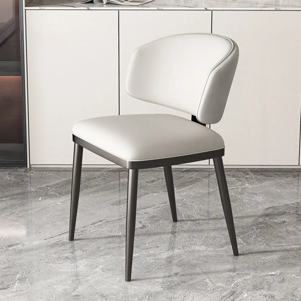 Modish Padded Upholstery Armless Low Back Dining Chair Image - 45