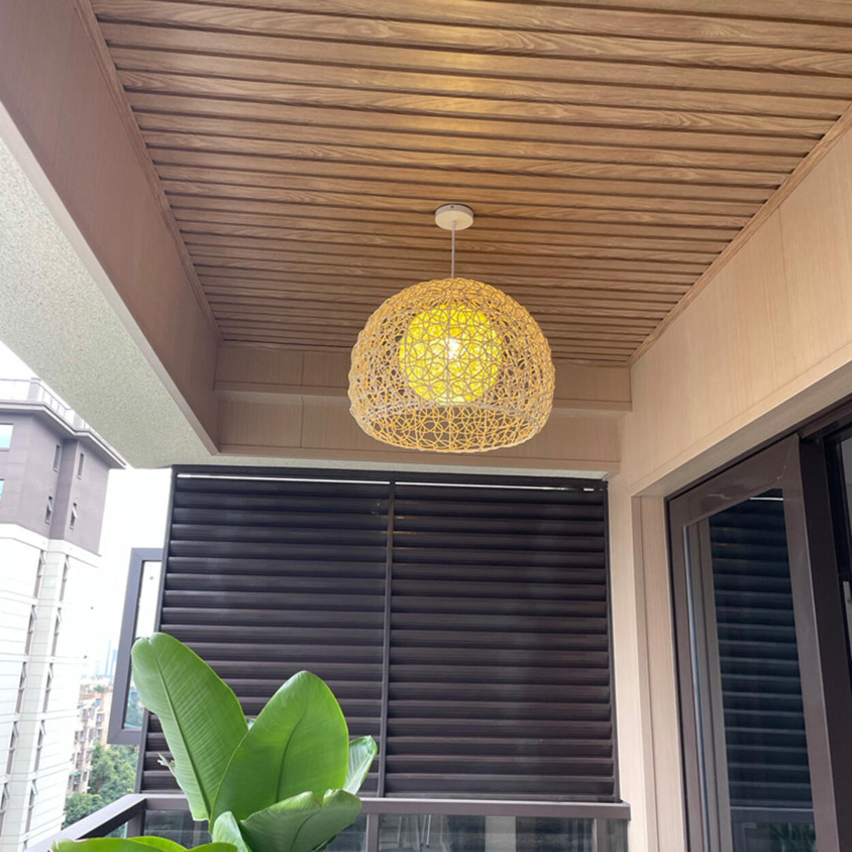 Oriental Rattan Wood Round Drum LED Pendant Light Image - 8