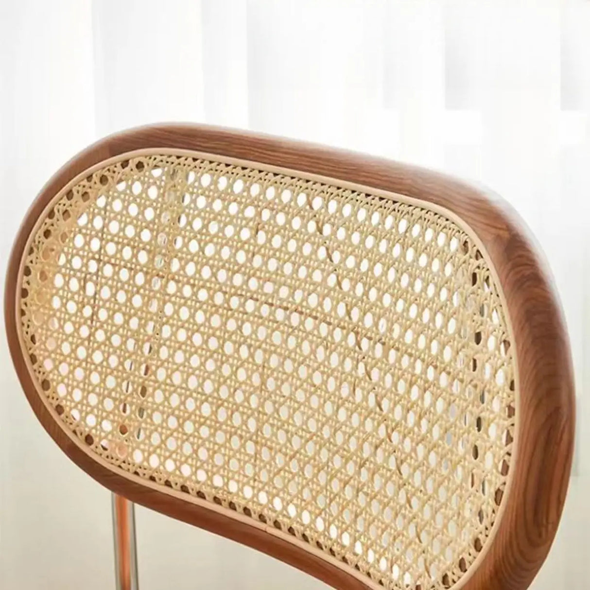 Oval Rattan Back Round Leather Stackable Dining Chair Image - 11