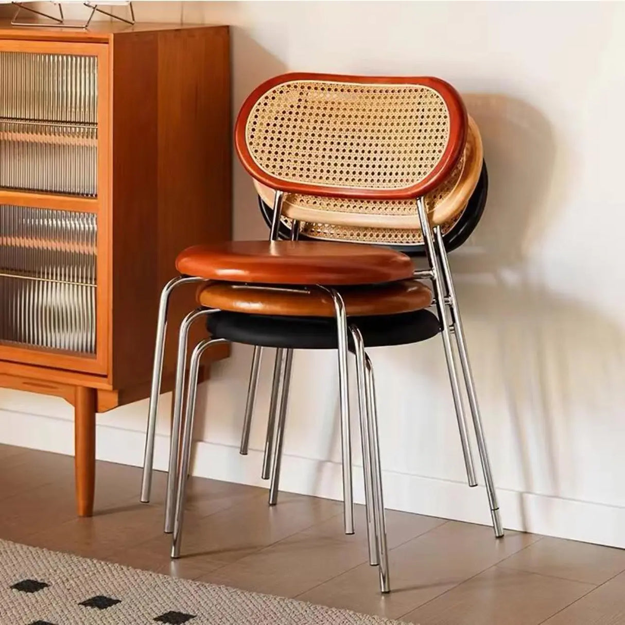 Oval Rattan Back Round Leather Stackable Dining Chair Image - 1