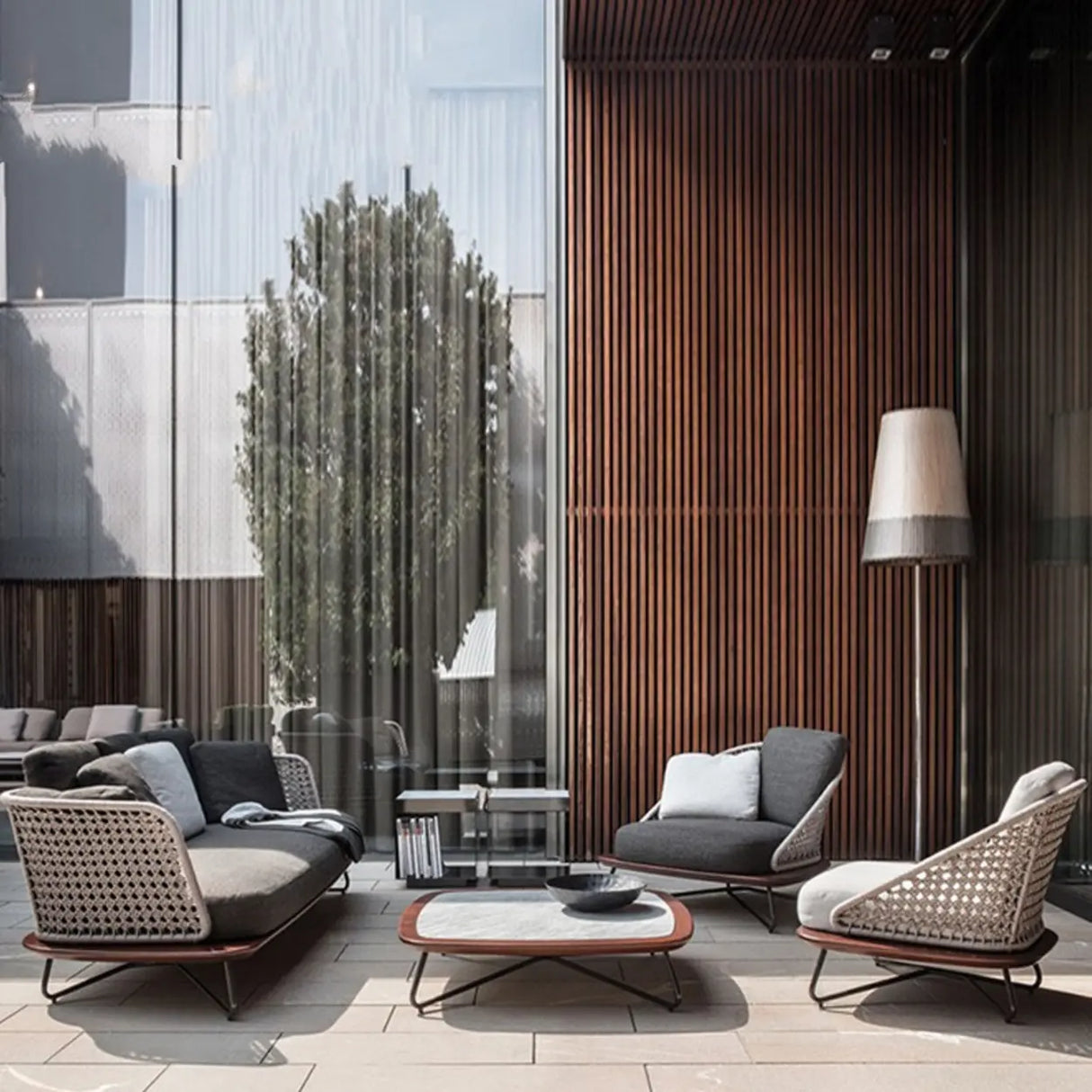 Patio Stone Coffee Table Set and Gray Upholstered Sofa Image - 3