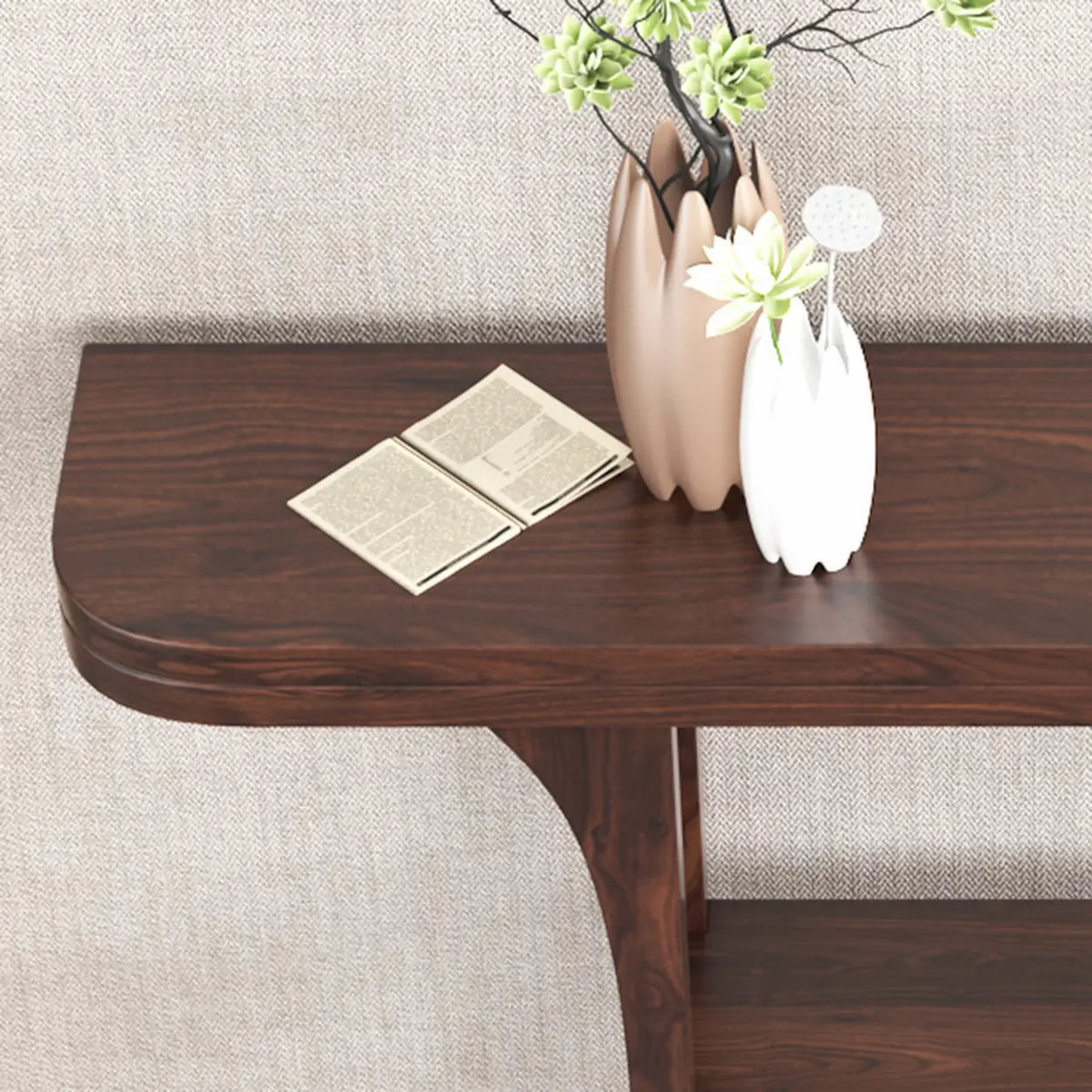 Close-up of the rounded edge and wood grain on the corner of a rich brown demilune console table