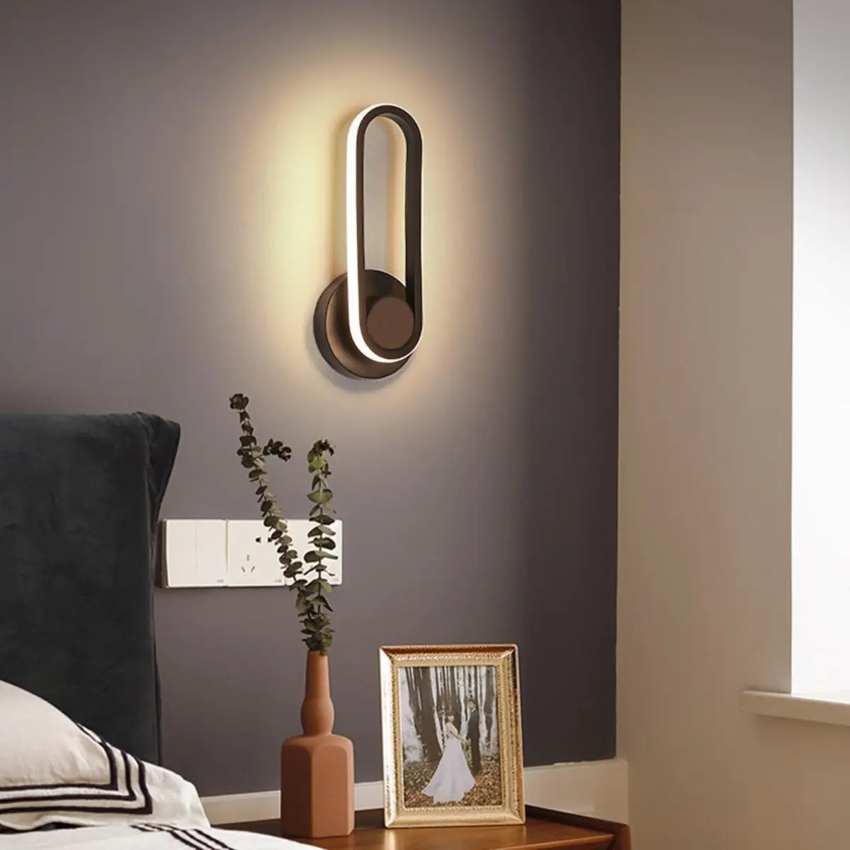 Rotatable Black Oval Bedside LED Wall Sconce Light Image - 4