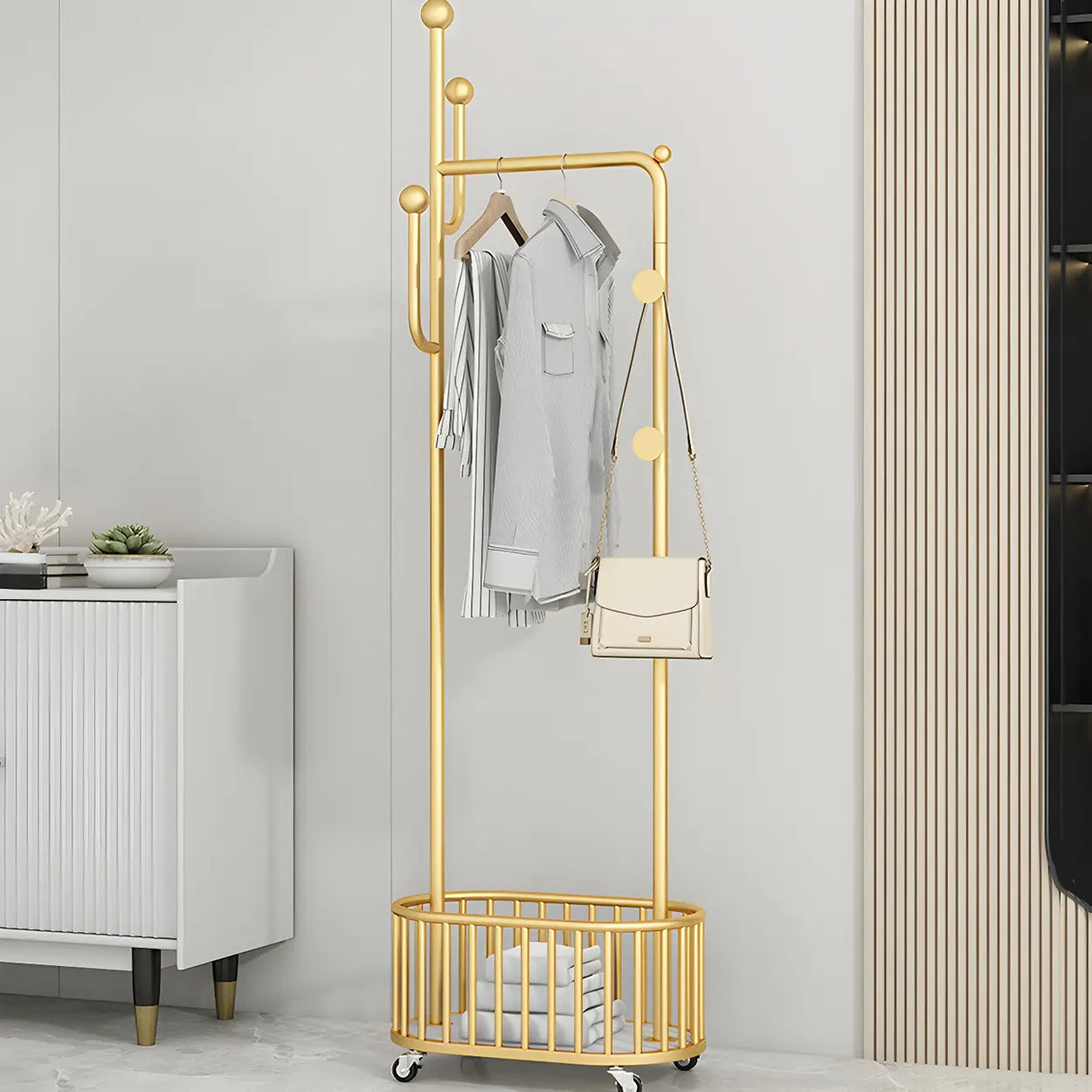 Sleek Gold Metal Coat Rack with Storage Basket and Casters Image - 1