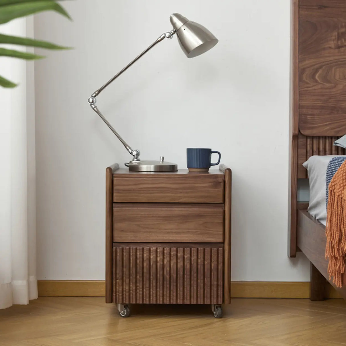 Traditional Walnut Wood Nightstand with Drawers and Casters Image - 1