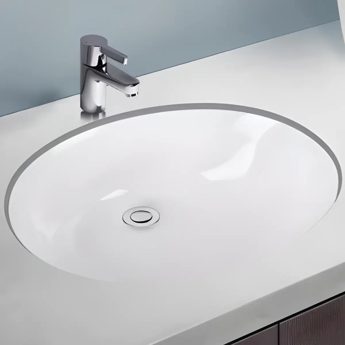 White Undermount Oval Ceramic Sink with Supply Lines Image - 3
