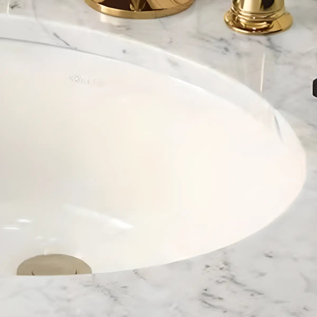 White Undermount Oval Ceramic Sink with Supply Lines Image - 7