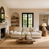 Beige 3-seater suede modular sofa with three deep seat cushions in a neutral living room