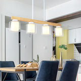 4-Light Minimalist Cylinder Wooden Island Pendant Light Image - 4