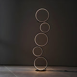 Artistic Modern Stacked Ring LED Bedside Floor Lamp Image - 8