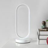 Bedroom Black Oval LED Minimalist Metal Table Lamp Image - 11