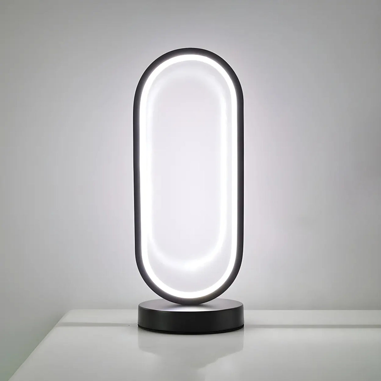 Bedroom Black Oval LED Minimalist Metal Table Lamp Image - 6