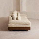 Beige Cotton Linen Pillow Back Brown Wood Frame Sofa Image - 8