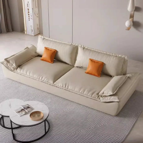 Beige Water Resistant Leather Sofa with Slipcover Image - 1