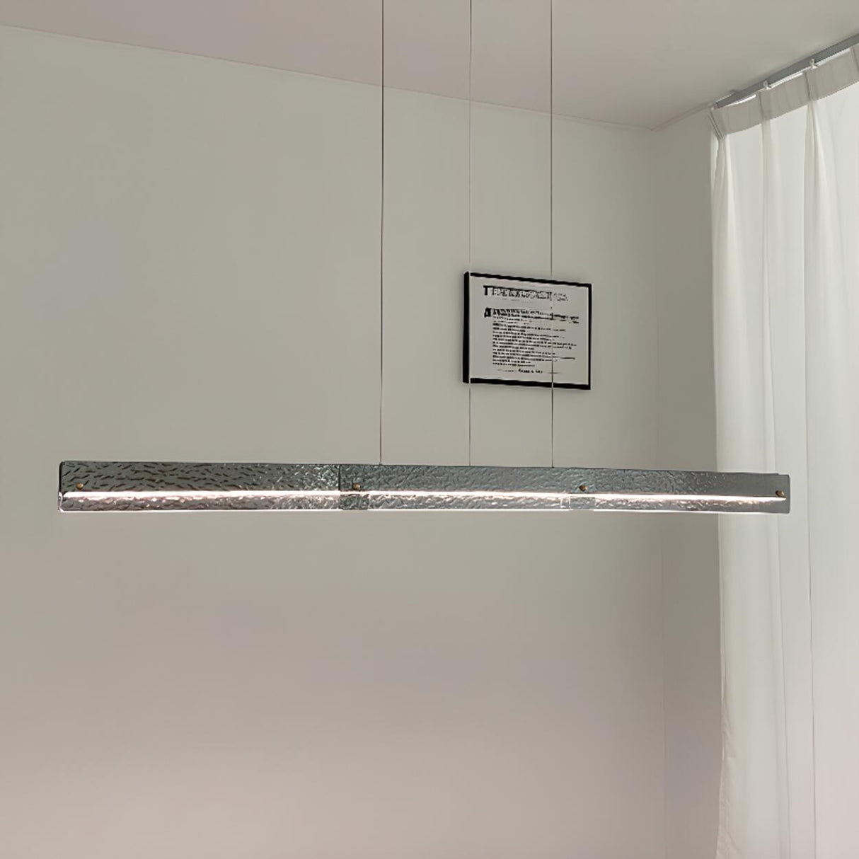 Contemporary Hammered Metal Linear LED Pendant Light Image - 4