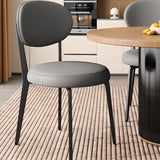 Contemporary Leather Armless Low Curved Back Dining Chair Image - 4