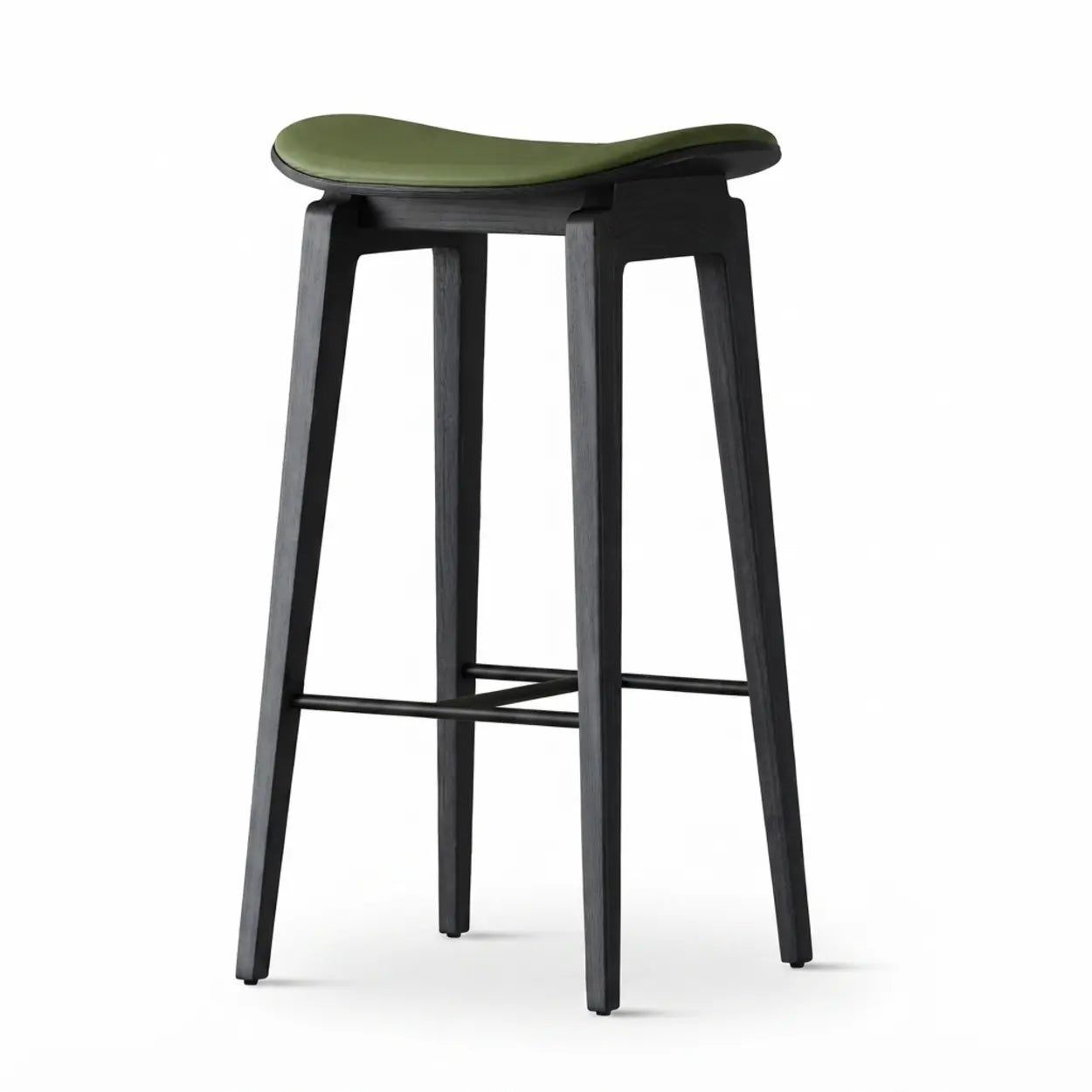 Green faux leather counter stool with a curved saddle seat, black wood frame and black footrest isolated on white