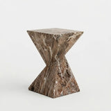 Brown veined faux stone side table with a twisted geometric pedestal isolated on a white background