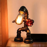 Industrial Metal Pipe Robot Bedroom Decor Table Lamp Image - 1