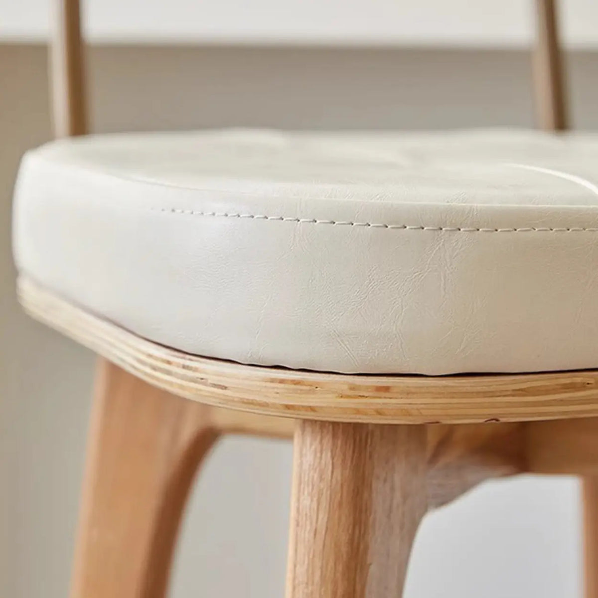 Leather Upholstered Tufted Wood Bar Stool with Metal Footrest Image - 14