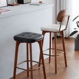 Leather Upholstered Tufted Wood Bar Stool with Metal Footrest Image - 4