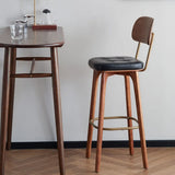 Leather Upholstered Tufted Wood Bar Stool with Metal Footrest Image - 7