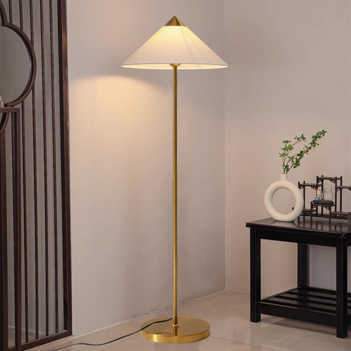Living Room Sleek Pyramid Shade and Gold Floor Lamp Image - 6