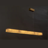 Minimalist Brass Slim Alabaster LED Linear Pendant Island Light Image - 2