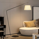 Minimalist Drum Shade and Black Arc Metal Floor Lamp Image - 2