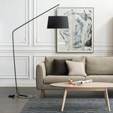 Minimalist Drum Shade and Black Arc Metal Floor Lamp Image - 3