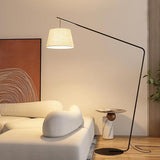 Minimalist Drum Shade and Black Arc Metal Floor Lamp Image - 4