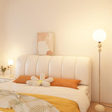 Minimalist Stacked Green Accents and Globe Floor Lamp Image - 4