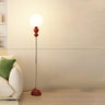 Minimalist Stacked Green Accents and Globe Floor Lamp Image - 9