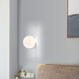 Minimalist White Glass Globe Bedroom Wall Sconce Image - 4