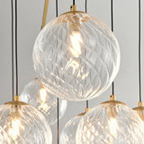 Modern 7-Light  Brass Branch Textured Glass Globe Chandelier Image - 5