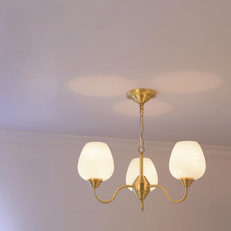 Modern 8- Light Brass Ripple White Glass Chandelier Image - 2