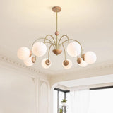 Modern 8-Light Gold White Glass Swirl Globes Chandelier Image - 4