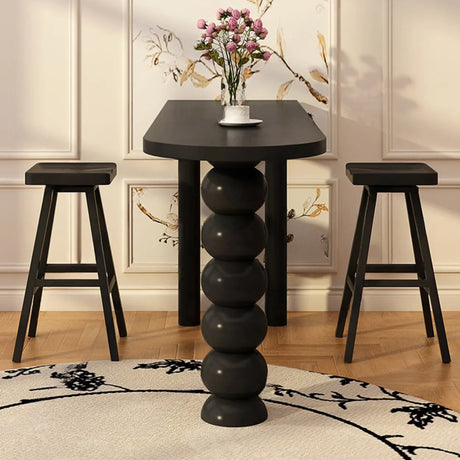Modern Black Bar Table Set with Artistic Sculpted Base Image - 1