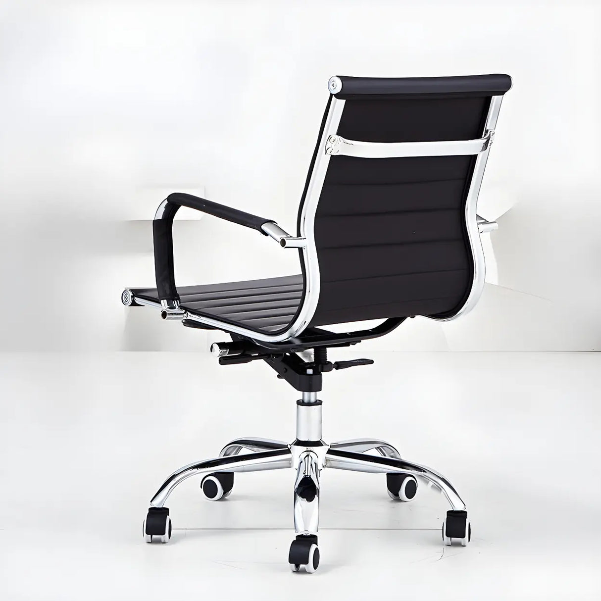 Modern Black Ergonomic Leather Office Chair with Wheels Image - 3
