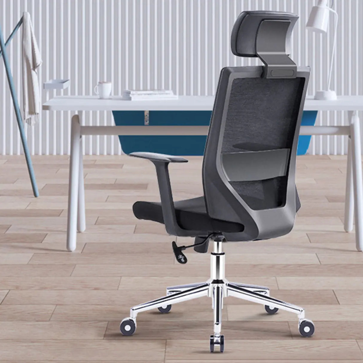 Modern Black High-Back Mesh Office Chair with Headrest Image - 4